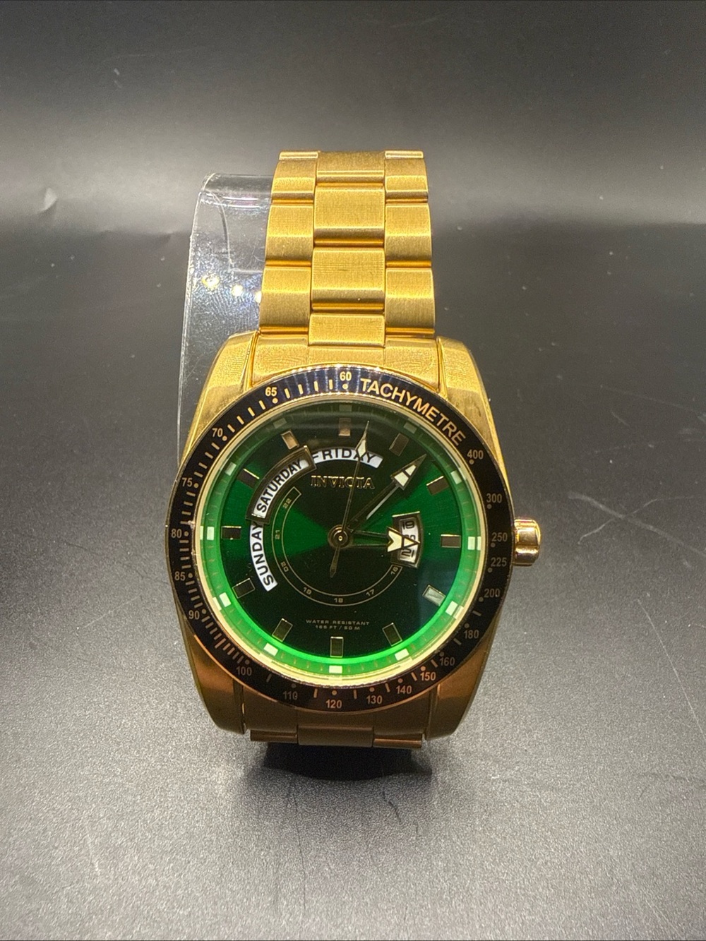 Invicta Specialty 6320 (a 45mm gold and green-dial quartz watch)